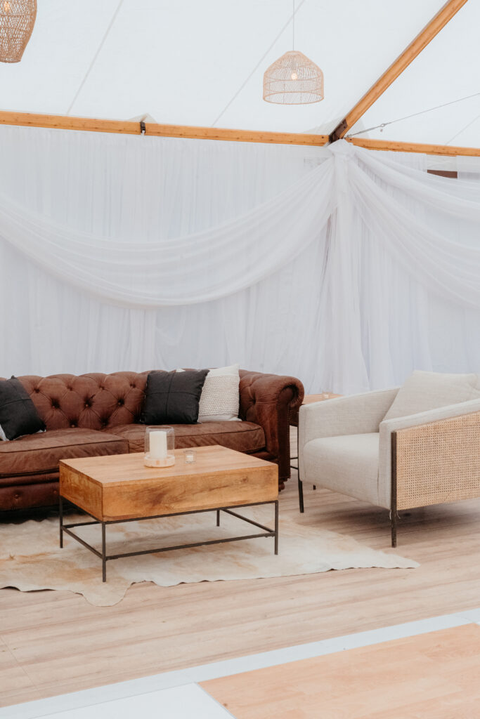This is the Place Luxury Furniture in Rustic Timbertrac Tent with Draping
